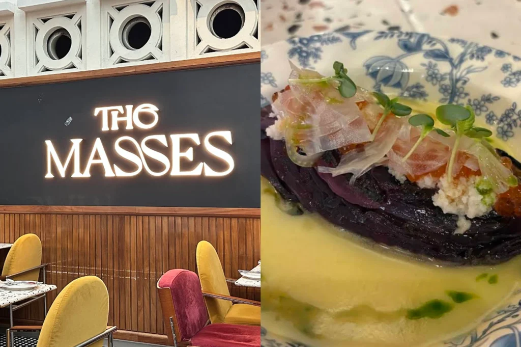 A glowing white "The Masses" sign sits above a modern dining area with velvet mustard and deep red chairs, reflecting a chic, mid-century aesthetic. This is paired with a high-angle shot of a signature fusion dish served in a blue and white floral bowl, featuring layers of purple cabbage topped with delicate crab meat and translucent garnishes in a pool of creamy yellow sauce.